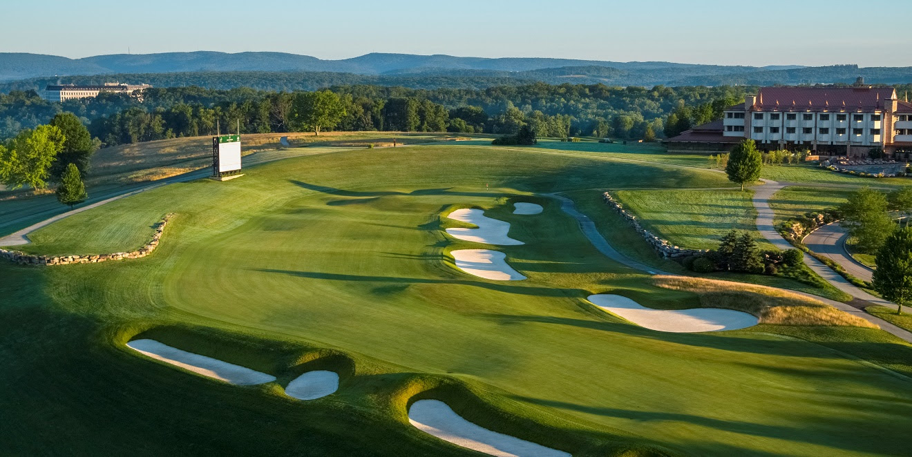 A golf course with sand bunkers
Description automatically generated with low confidence