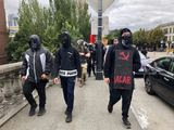 Anti-fascist counter-demonstrators cross the Burnside Bridge across the Willamette River from the west side of the city to the east side in search of the far-right group, the Proud Boys, in Portland, Ore., Saturday, Aug. 17, 2019. Self-described anti-fascists vowed to confront the rally while leaders from the far-right urged their followers to turn out in large numbers to protest the arrests of multiple members of right-wing groups in the run-up to the event. Antifa members often cover their faces with masks, making it harder to identify them. (AP Photo/Gillian Flaccus) ** FILE **