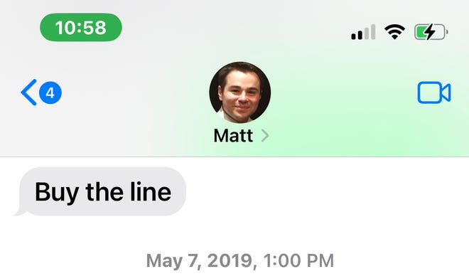 A text message from Matt Gilson to Frank Pallotta about the county line.