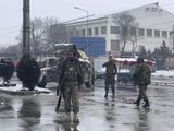 National army soldiers arrive at the site of explosion near the military academy in Kabul, Afghanistan, Tuesday, Feb. 11, 2020. The explosion occurred early Tuesday near the military academy in a southern neighborhood of the Afghan capital, a government spokesman said. (AP Photo/Rahmat Gul)
