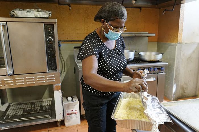 Every Friday night, long after everyone else in her house has gone to bed, Doramise Moreau can be found in the kitchen, cooking plate after plate of chicken, turkey, rice, and beans. She's been doing this since the pandemic began last spring and doesn't plan on stopping. Moreau, 60, cooks at least 1,000 meals every week for the hungry, delivering them to Miami's Notre Dame d'Haiti Catholic Church. Even as a child, Moreau wanted to make sure people were fed. ''She takes care of everybody from A to Z,'' Reginald Jean-Mary, Notre Dame d'Haiti's pastor, told reporters. ''She's a true servant. She goes above and beyond the scope of work to be a presence of hope and compassion for others.''