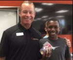 Student with his sponsor prize. Student with his sponsor prize.