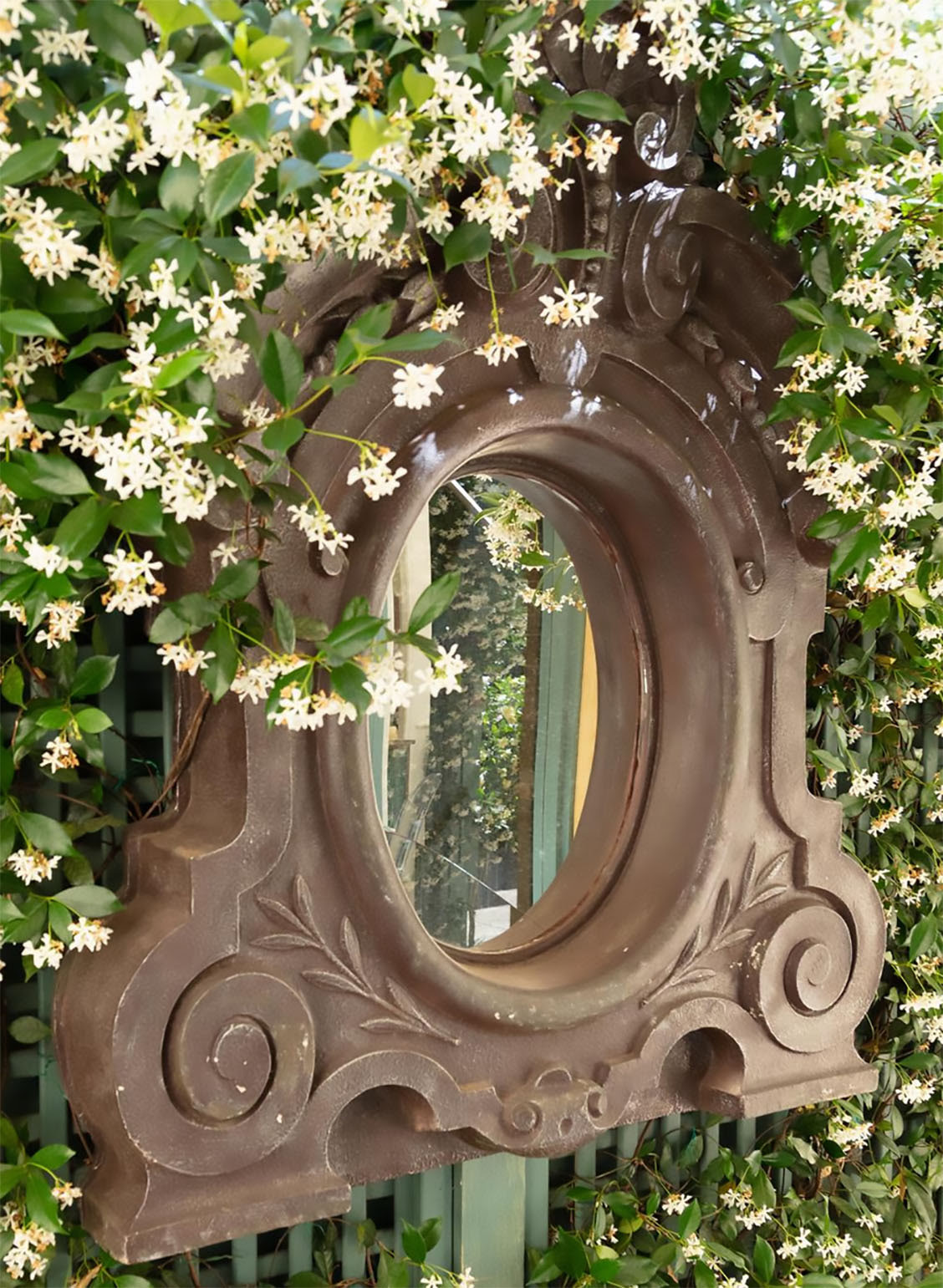 Lot 116. An outdoor Italianate fibreglass mirror