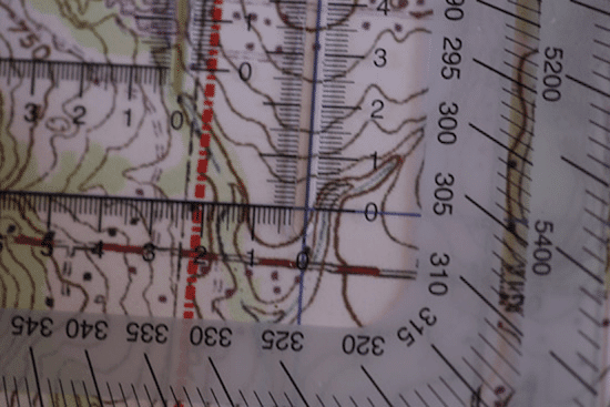 land navigation lining up protractor and topo topographic map