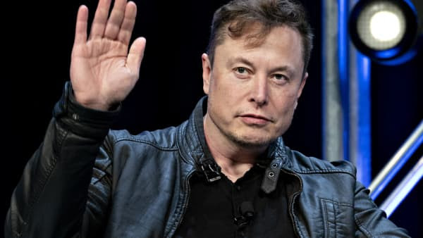 Elon Musk waves 