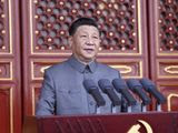 In this photo provided by China&#39;s Xinhua News Agency, Chinese President and party leader Xi Jinping delivers a speech at a ceremony marking the centenary of the ruling Communist Party in Beijing, China, Thursday, July 1, 2021. China’s Communist Party is marking the 100th anniversary of its founding with speeches and grand displays intended to showcase economic progress and social stability to justify its iron grip on political power that it shows no intention of relaxing. (Ju Peng/Xinhua via AP)