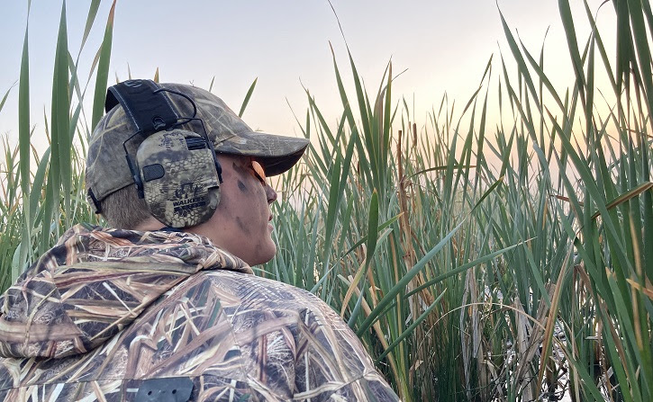 A young duck hunter hides in the tules at the Modoc National Wildlife Refuge near Alturas.