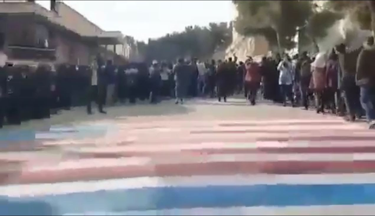 Walking on the flag is seen as a mark of disrespect in Iran