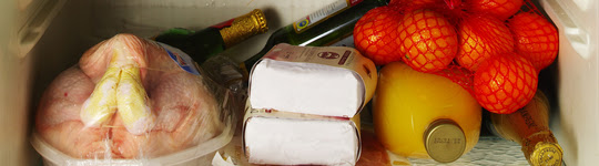 Refrigerator shelf with assorted food items.