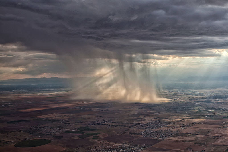 distant-storm-cloud-seen-from-airplane-window