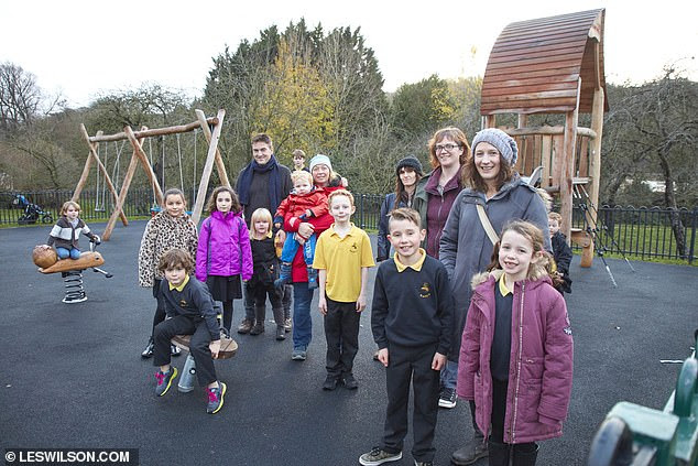 Parents and children at The Orchard after its revamp. A
            local organisation, Bath Recreation Ltd, stepped in to offer
            support and community efforts helped raise £2,500 towards
            the new playground, which opened in the summer