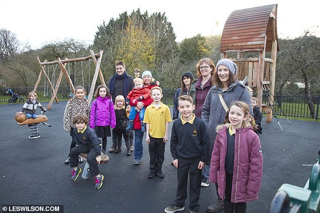 Parents and children at The Orchard after its revamp. A
local organisation, Bath Recreation Ltd, stepped in to offer
support and community efforts helped raise £2,500 towards
the new playground, which opened in the summer