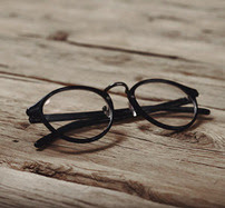 glasses on wooden floor