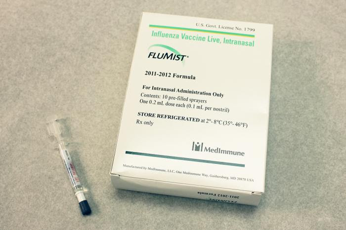 This image depicts a box containing ten prefilled FluMist® live attenuated intranasal vaccine (LAIV) sprayers