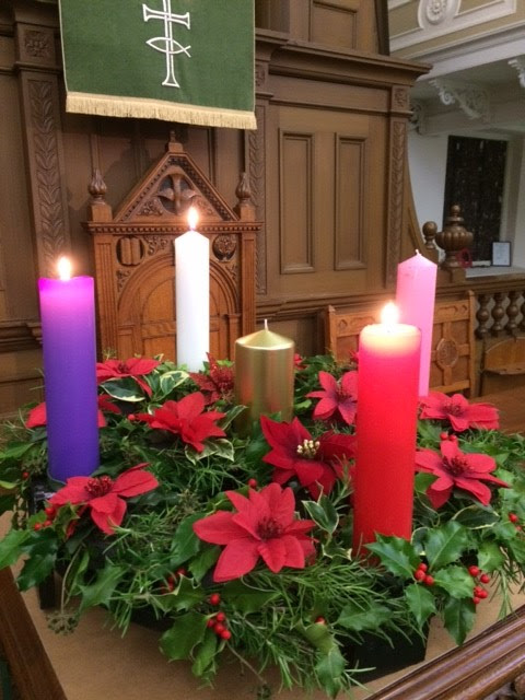 Three Advent candles lit