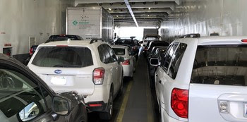 Photo of vehicles on a ferry car deck