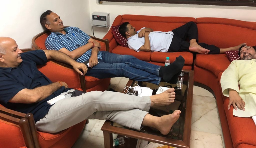 Delhi Chief Minister Arvind Kejriwal, deputy Chief Minister Manish Sisodia and other during their sit-in protest at the residence of the Delhi Lieutenant Governor in June. (Photo credit: Nagender Sharma/Twitter).