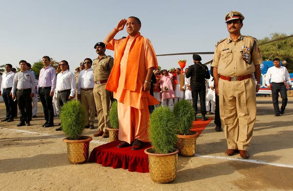 Yogi Adityanath, center, the chief minister of Uttar Pradesh, India’s most populous state. His government proposed changing the name of Meerut to Godse City.