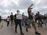 Protesters march in a Black Lives Matter demonstration organized by the Dallas Black Firefighters Association on Juneteenth 2020 in Dallas, Friday, June 19, 2020. Juneteenth marks the day in 1865 when federal troops arrived in Galveston, Texas to take control of the state and ensure all enslaved people be freed, more than two years after the Emancipation Proclamation. (AP Photo/LM Otero)