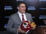 In this Jan. 2, 2020, file photo, Washington Redskins new head coach Ron Rivera holds up a helmet during a news conference at the team&#39;s NFL football training facility in Ashburn, Va. The NFL Draft is April 23-25. (AP Photo/Alex Brandon) ** FILE **