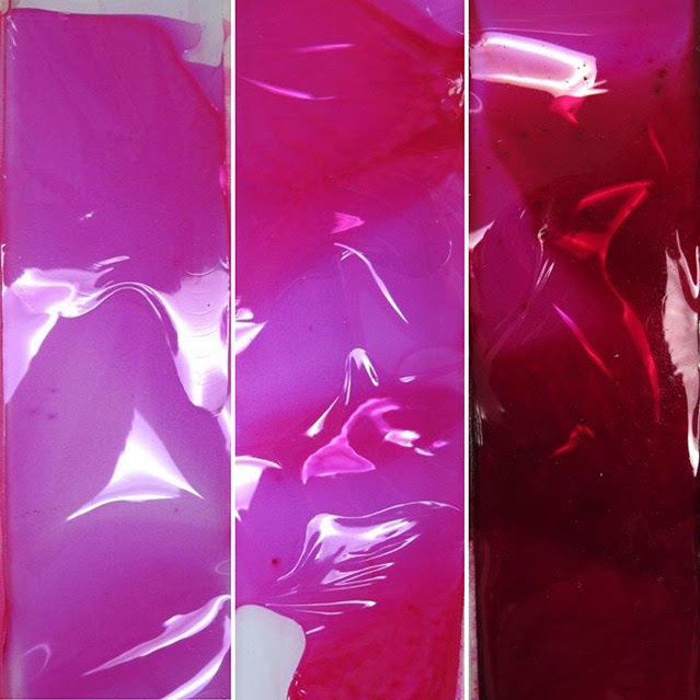 Films of Rhodamine B in nitrocellulose lacquer. From left to right: 2%, 8% and 80% concentration of dye.