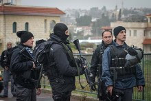 Israeli security forces patrolling the streets of the Israeli Arab village of Arara, searching for gunman Nashat Milhem.