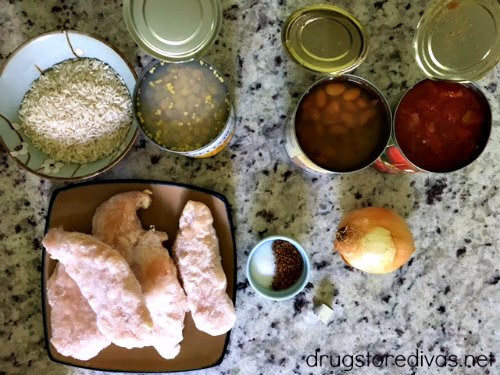 Slow Cooker Chicken Burrito Bowl ingredients on a counter.