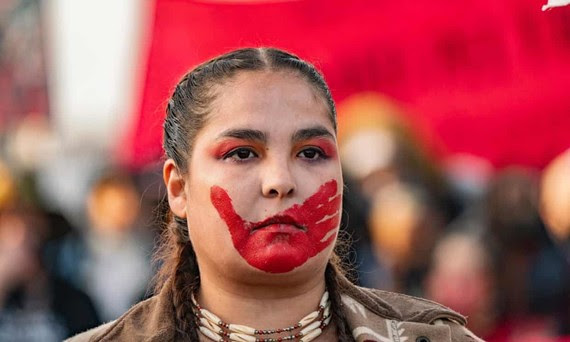 A demonstrator displaying a symbol of solidarity with missing and murdered Indigenous women and girls. Photograph: Keiko Hiromi/AFLO/Rex/Shutterstock