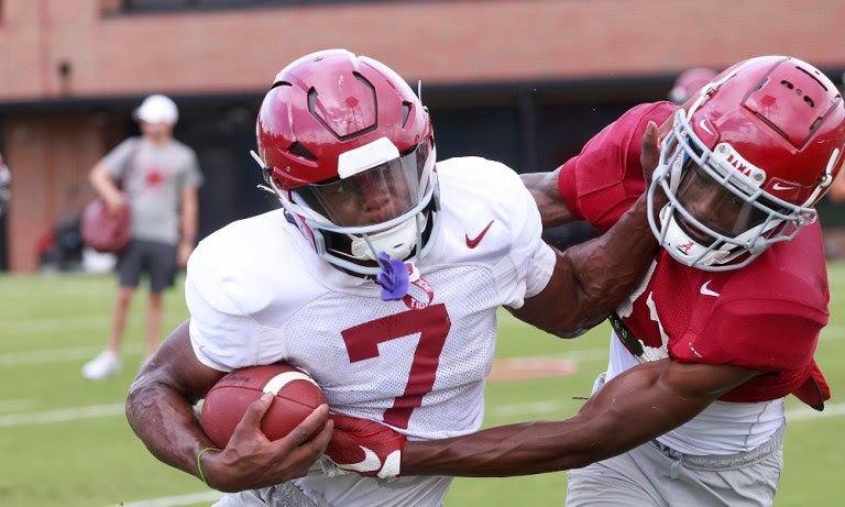 Alabama WR Ja'Corey Brooks (#7) pushing off a defensive back in 2022 Fall Camp Practice