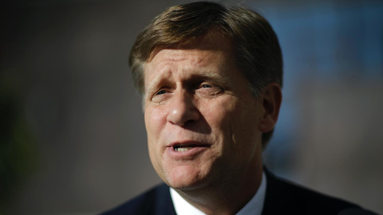 Former US ambassador to Russia, Michael McFaul, speaks with a reporter in Sochi, Russia, Feb. 7, 2014.