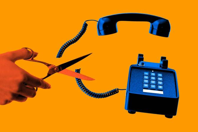 Someone literally cutting a phone cord