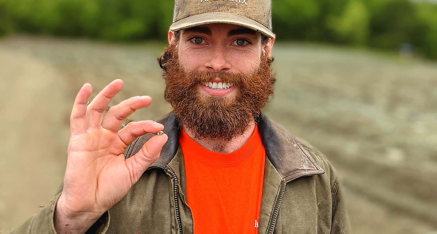 Man holding diamond he found in Crater of Diamonds State Park