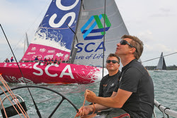 J/111 BLUR crossing tacks with Volvo 65 Team SCA